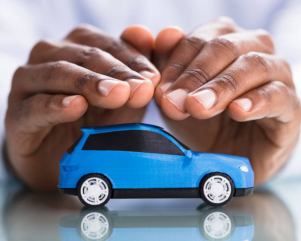 hands above toy car